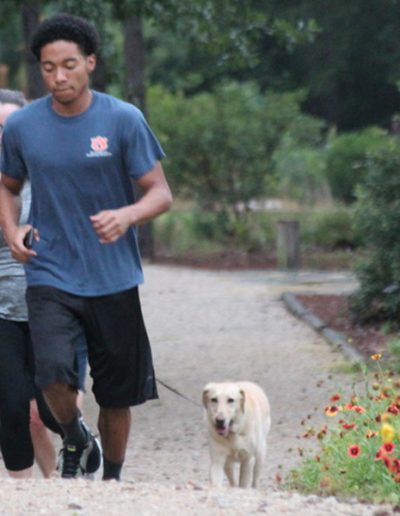 Dogtor Moose runs with friends at CWE Parent Run